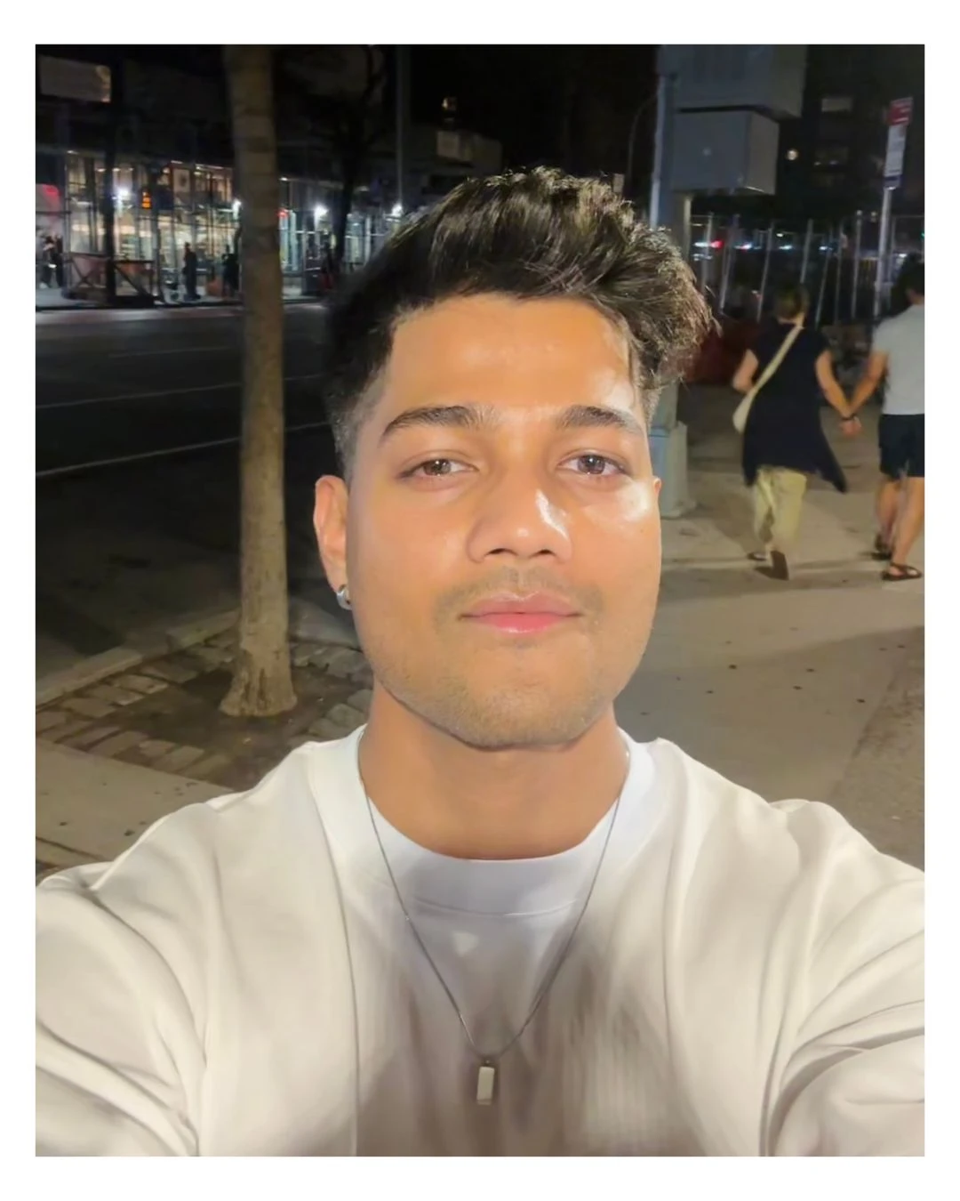 Mehul Ahire taking evening selfie outdoors in urban setting